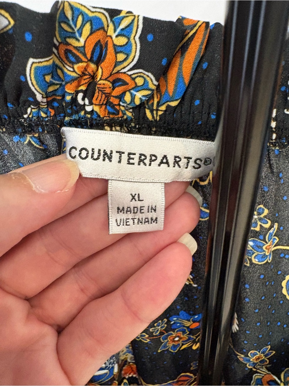 Counterparts Black Floral Tie-Neck Blouse with Blue and Orange Accents - Picture 4 of 5